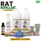 Herby Rat Repellent concentrate kit with concentrate bottle, spray can, two dilutant jugs, funnel, and measuring cups, labeled "Quantity: 2.1 Litres"